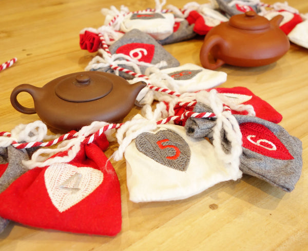 Tee-Adventskalender Girlande mit bunten Säckchen